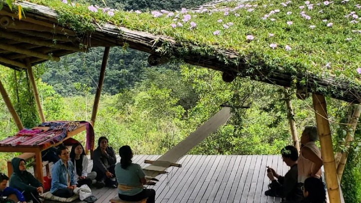 Local weaver demo in yoga deck