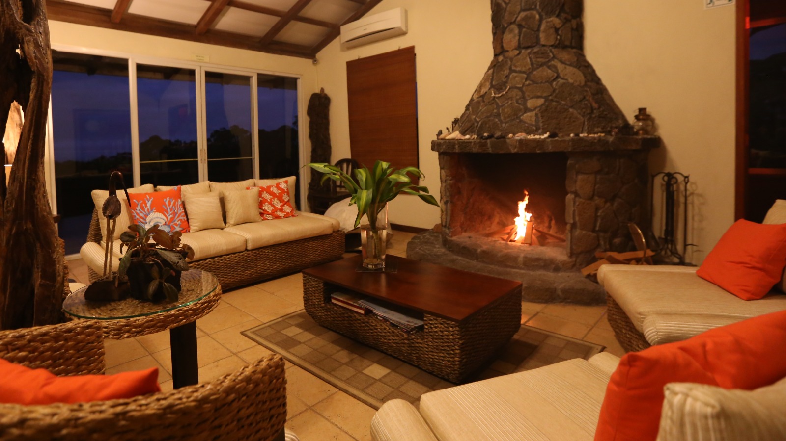 Three lounges with natural stone fireplaces